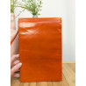 Pochette Charles jourdan orange en cuir